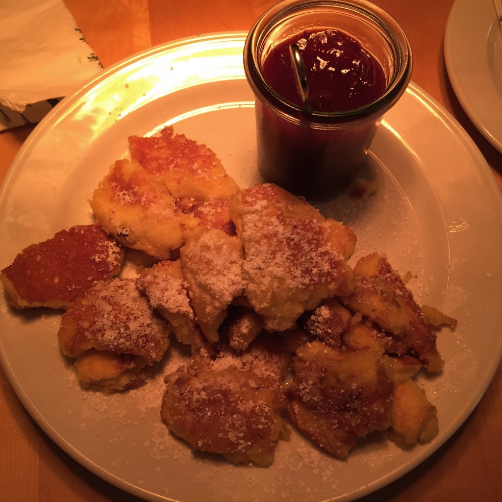 Kaiserschmarrn dessert is a traditional royal dessert for Emperor Franz Josef. It is basically shredded fluffy raisins pancakes served with delicious prune compote. Absolutely delicious!